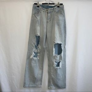 light-washed blue denim ripped jeans